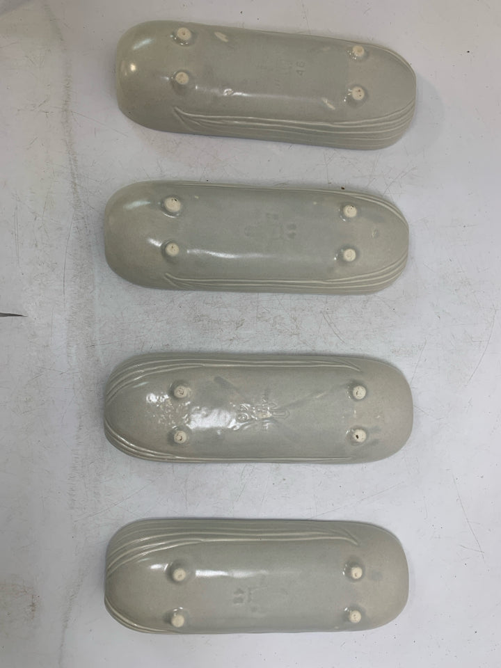 4 CERAMIC CORN ON THE COBB HOLDERS.
