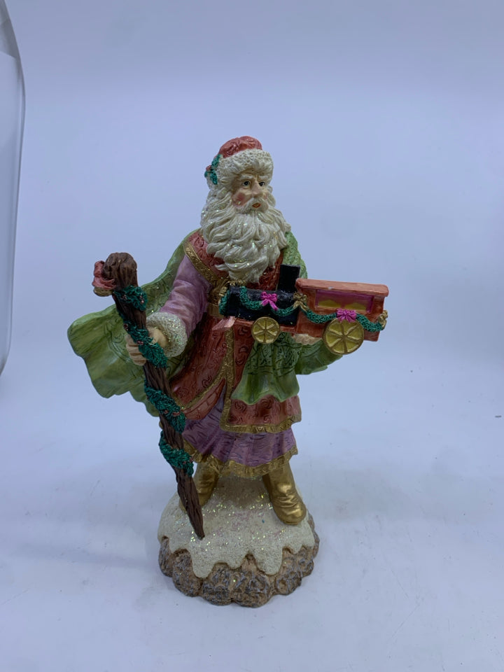 RESIN SPARKLE SANTA HOLDING STICK/TRAIN.