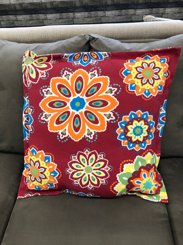LARGE RED MEDALLION PILLOW.