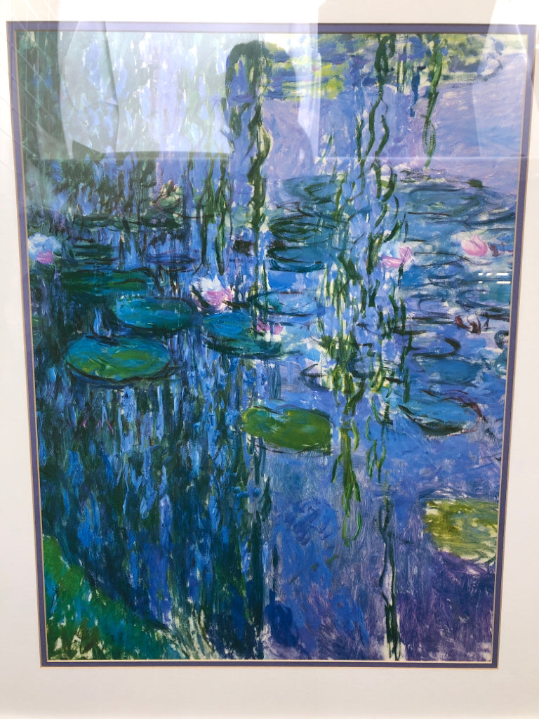 ABSTRACT LILY POND SCENE WALL HANGING IN SILVER FRAME.