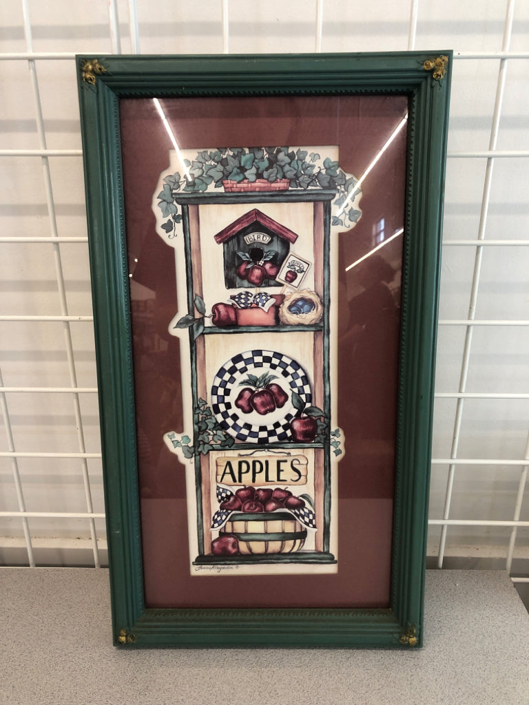 PRIMITIVE APPLE PRINT IN GREEN FRAME.