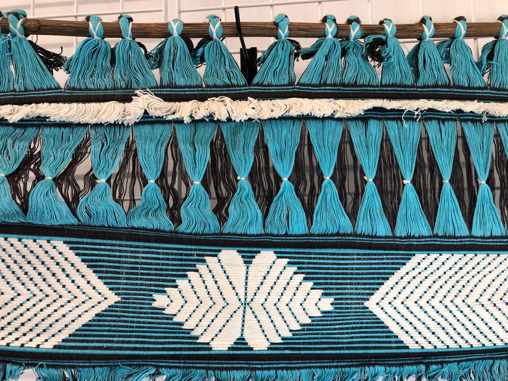 BLUE WOVEN TEXTILE TAPESTRY.