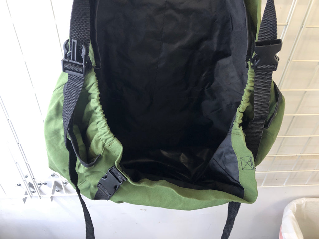 GREEN FABRIC FIREWOOD CARRIER BAG.