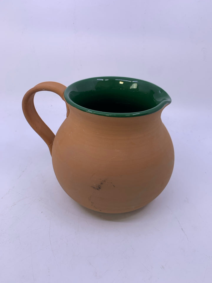 MATTER TERRA COTTA PITCHER W/ DARK GREEN GLAZED INSIDE.