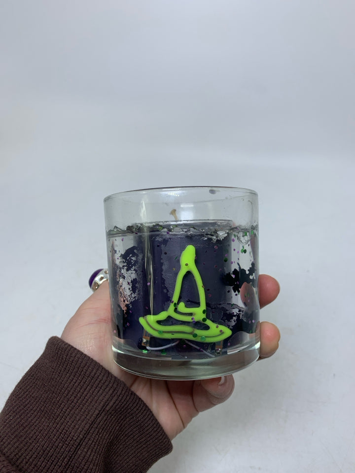SMALL WITCH THEMED CANDLE.