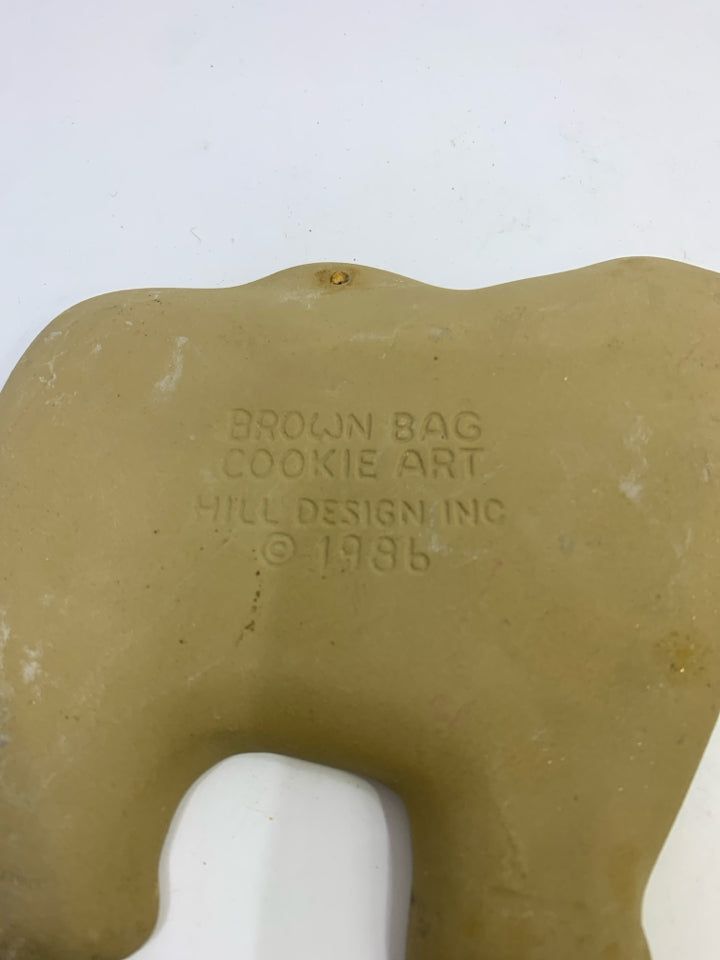 BROWN BAG CERAMIC COW COOKIE MOLD.