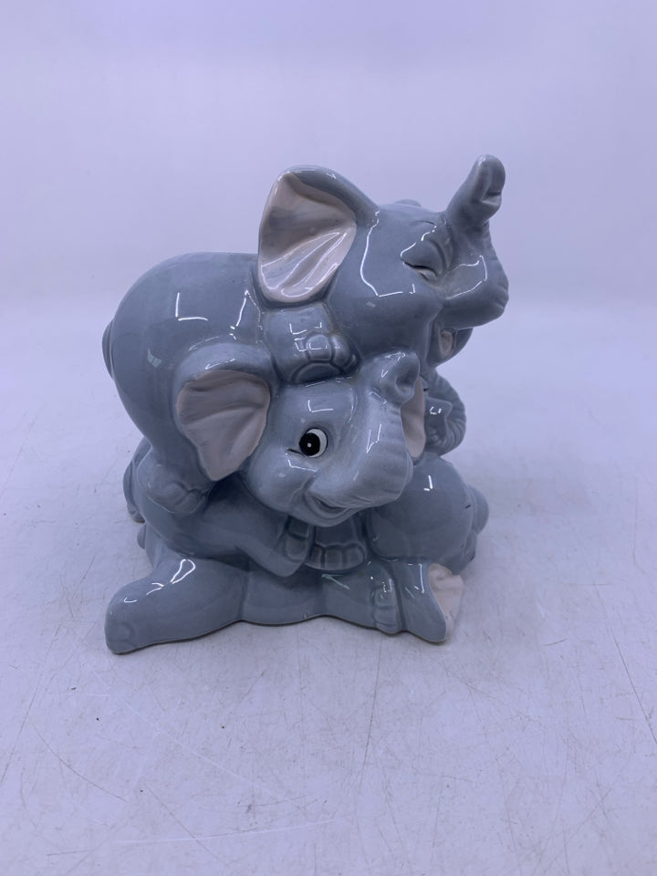 GREY CERAMIC 3 ELEPHANTS STACK ON TOP OF EACHOTHER.