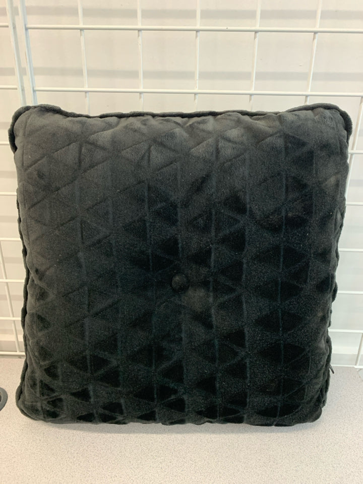 BLACK FUZZY PILLOW.