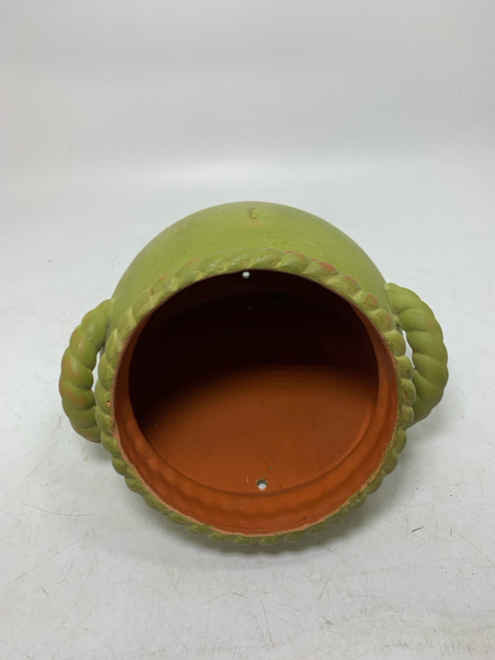 TERRA COTTA WALL VASE W/ BRAIDED HANDLES.