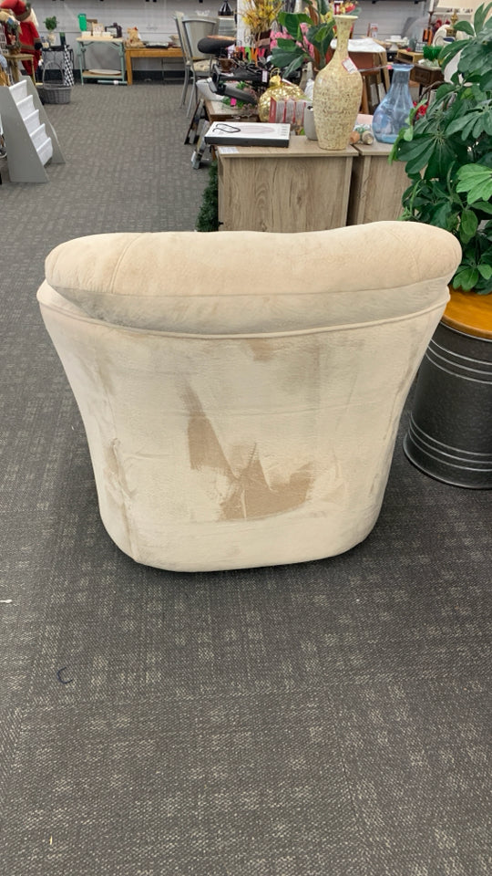CREAM COLOR SWIVEL ARM CHAIR.