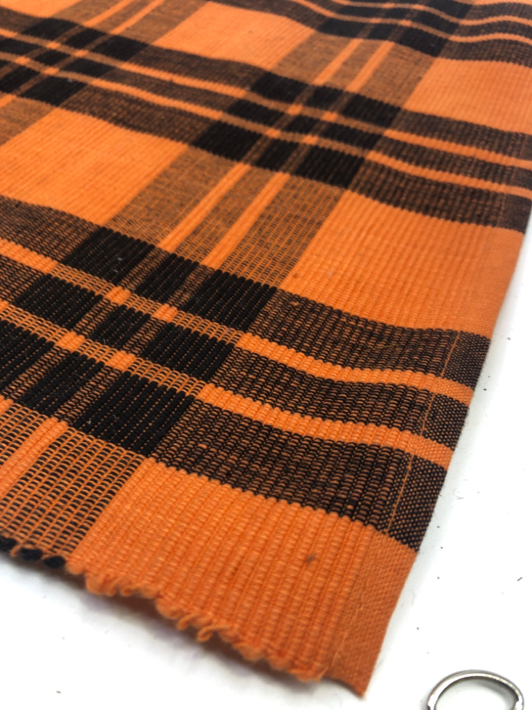 4 BLACK AND ORANGE PLAID PLACEMATS.