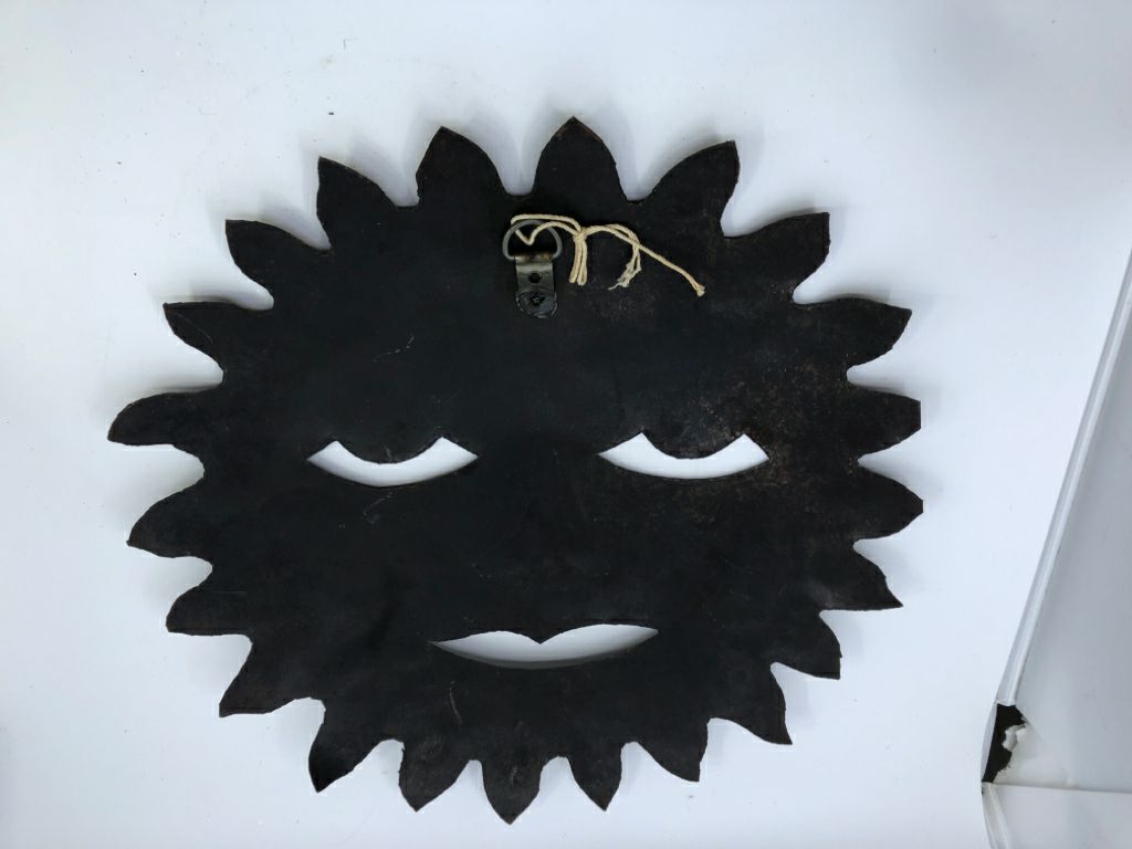HEAVY METAL SUN WALL DECOR.