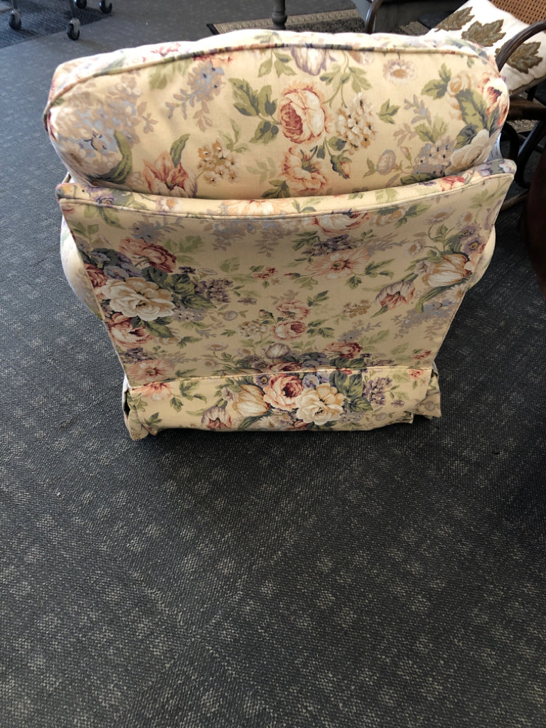 FLORAL SWIVEL ROCKER.