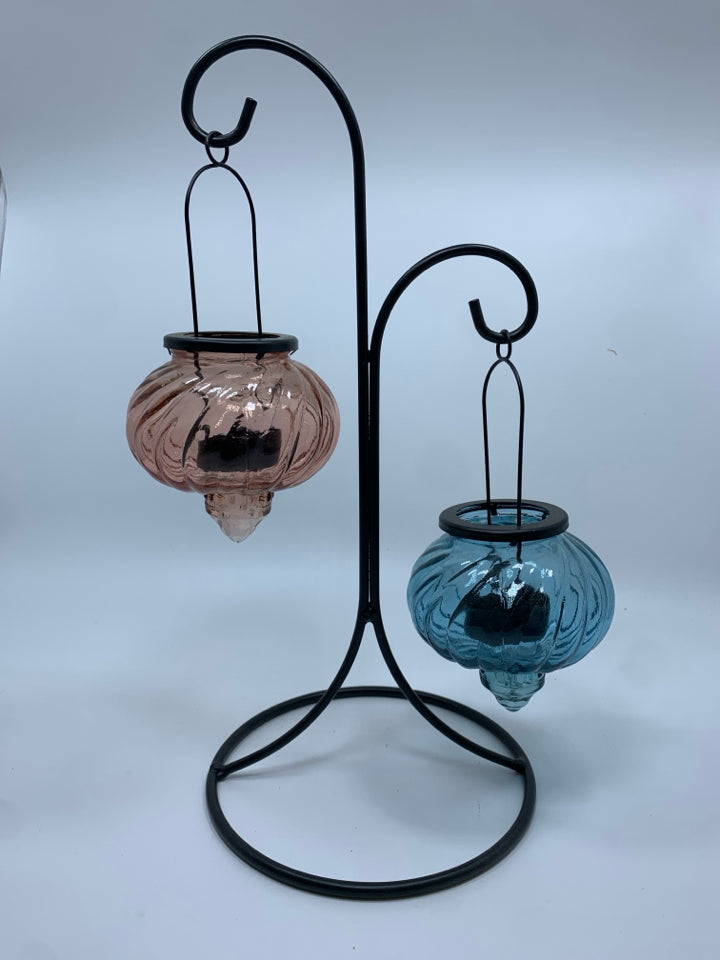 METAL TEA LIGHT HOLDER W/BLUE AND PINK GLASS VOTIVE GLOBES.