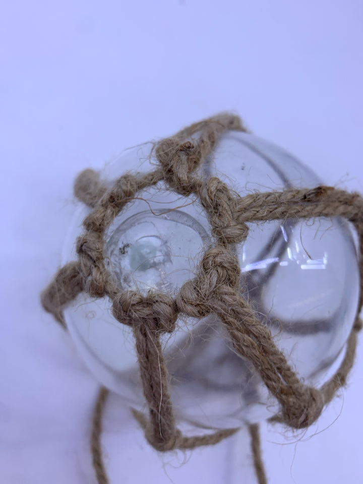 CLEAR GLASS GLOBE AND TWINE ORNAMENT.