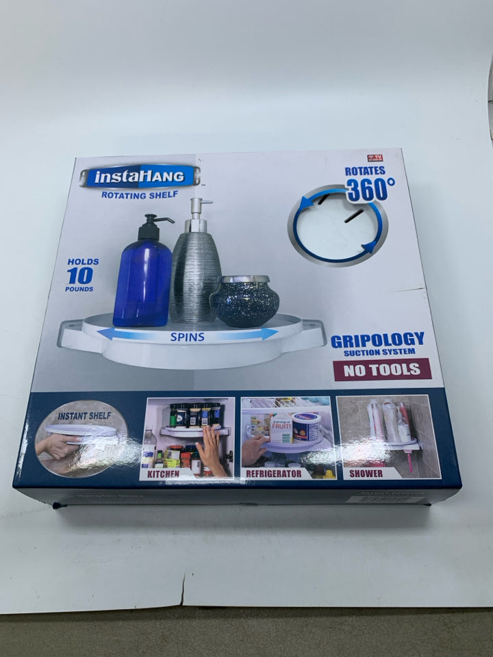 NIB ROTATING SHELF.