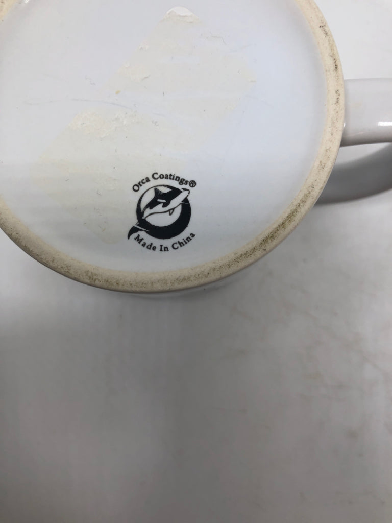 SQUIRREL ON CAT CUP.