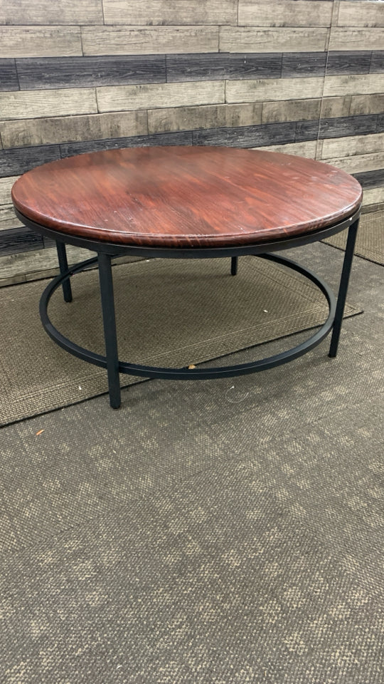 METAL BASE CHERRY WOOD CIRCLE COFFEE TABLE.