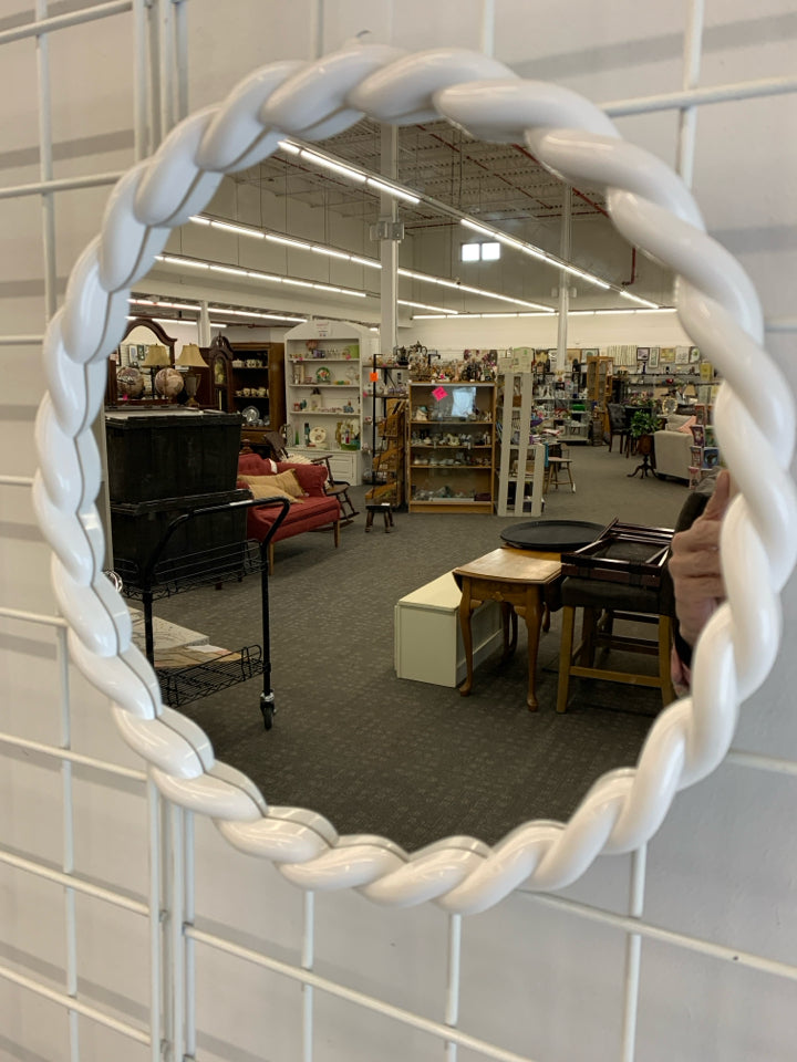 CIRCLE MIRROR W/WHITE PLASTIC BORDER.