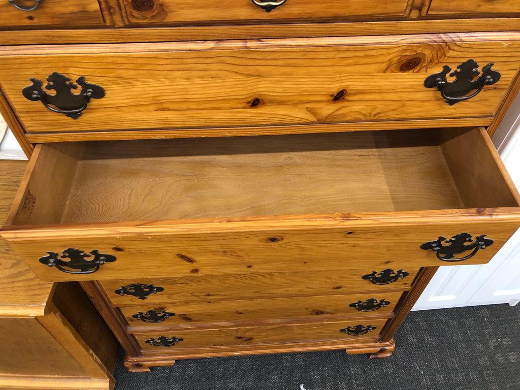 7 DRAWER TALL WOOD DRESSER.