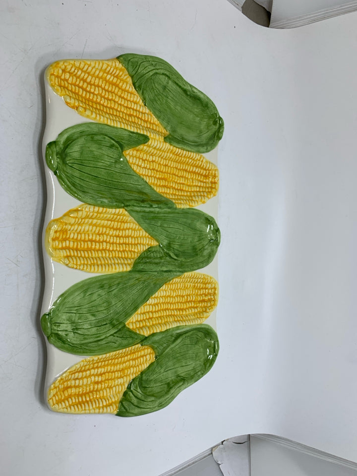 5 SLOT TEXTURED CORN HOLDER PLATE MADE IN PORTUGAL W/ HANDLES.