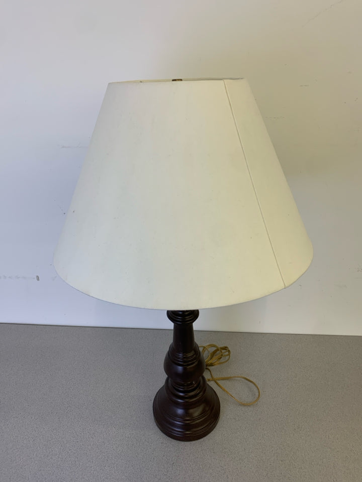 BROWN METAL LAMP WITH WHITE SHADE.