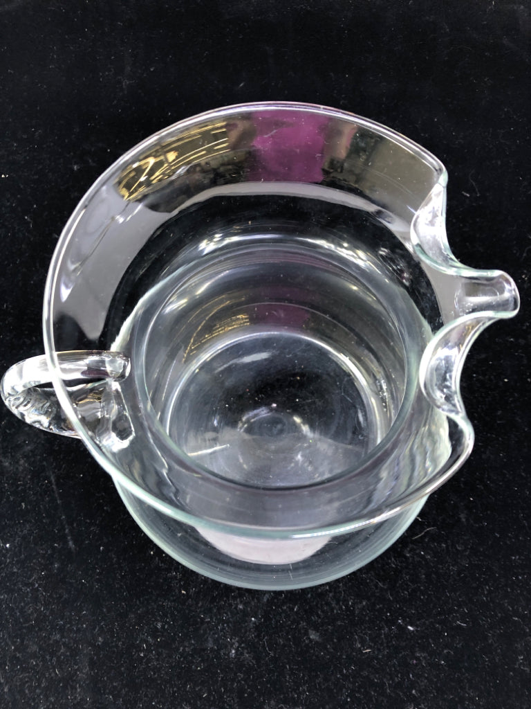CLEAR GLASS PITCHER WITH ICE LIP.