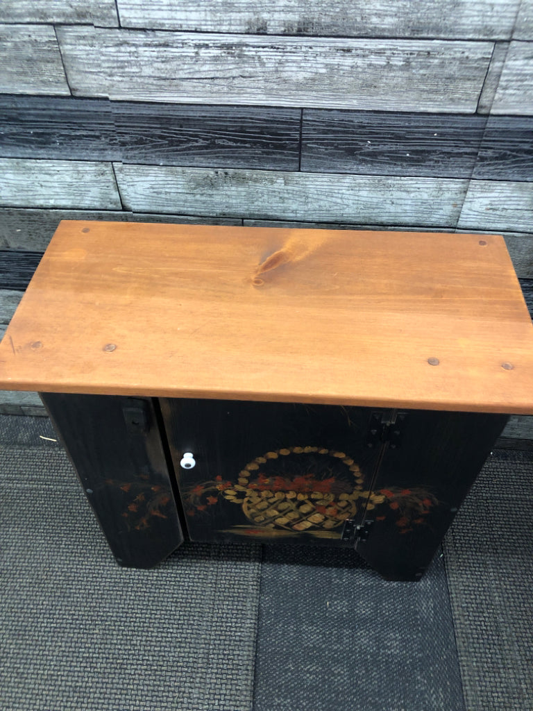 SMALL BLACK PAINTED BASKET CABINET/BENCH.