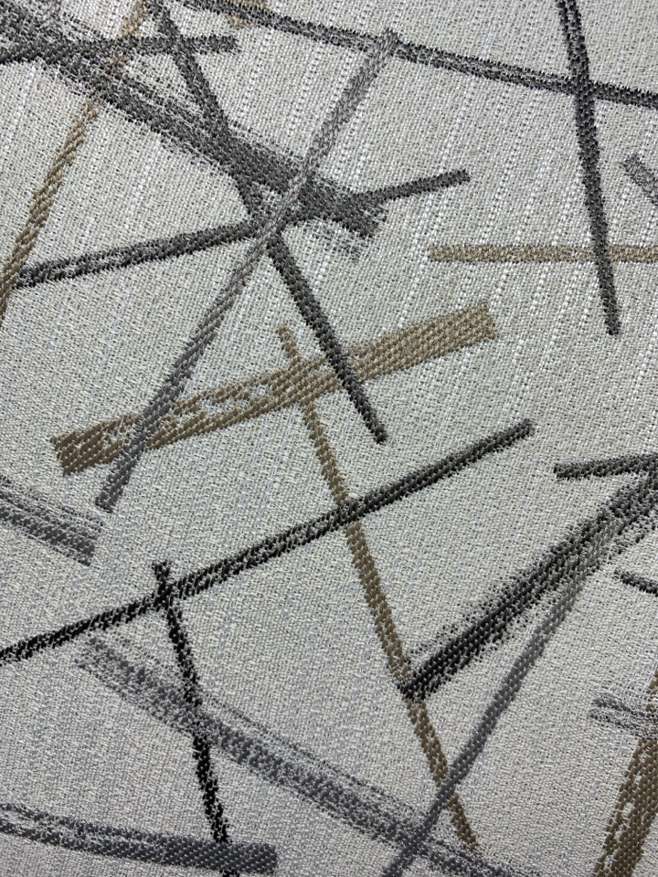 CREAM PILLOW W/GOLD, SILVER LINES.