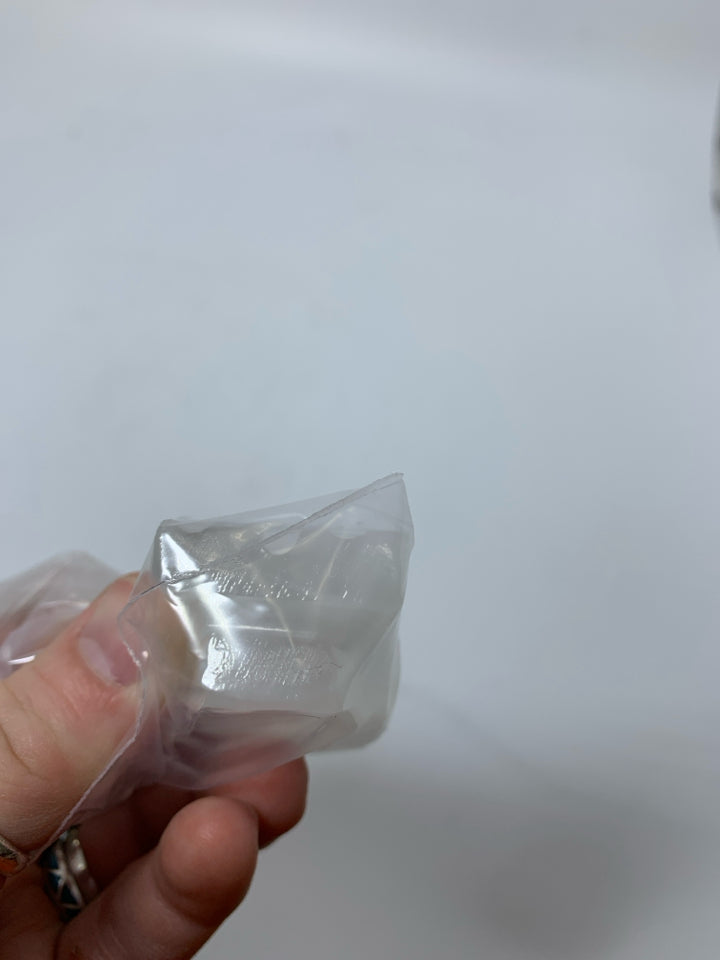 STONE CARVED CLEAR OWL IN BAG.