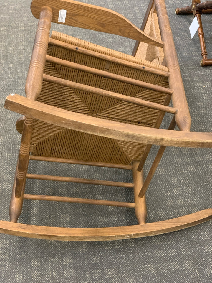 CRACKER BARREL WOVEN SEAT ROCKING CHAIR.