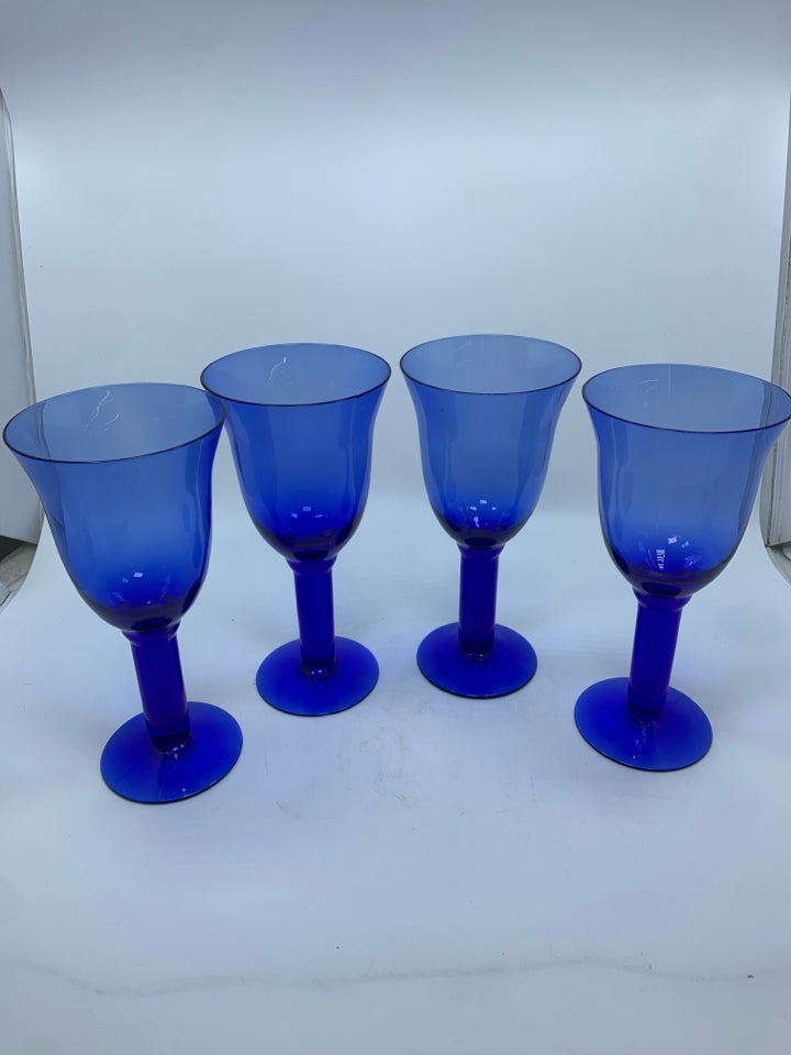 4 COBALT BLUE GLASS GOBLETS W/THICK STEMS.
