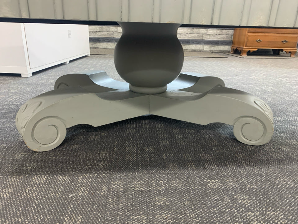GREY WASHED COFFEE TABLE ON PEDESTAL BASE.