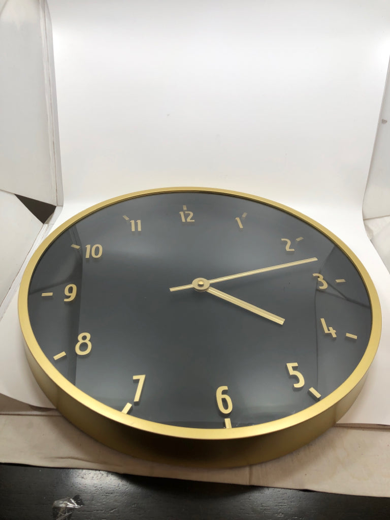LARGE BLACK/GOLD WALL CLOCK.