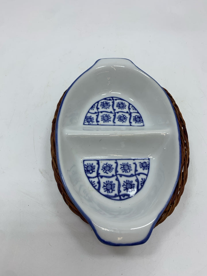 SM DIVIDED BLUE DISH IN WICKER BASKET.