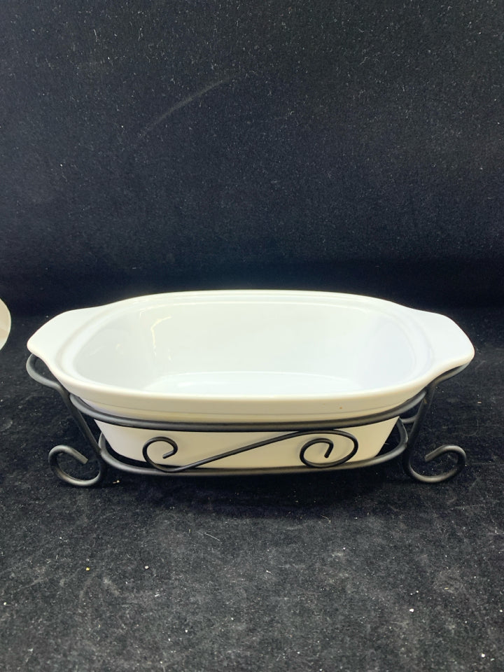 WHITE SMALL BAKING DISH IN BLACK METAL STAND.