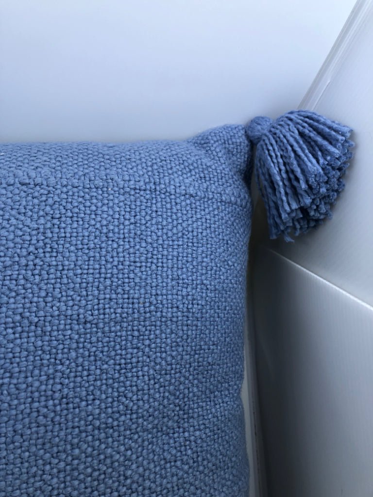 LT BLUE PILLOW W/TASSLES.