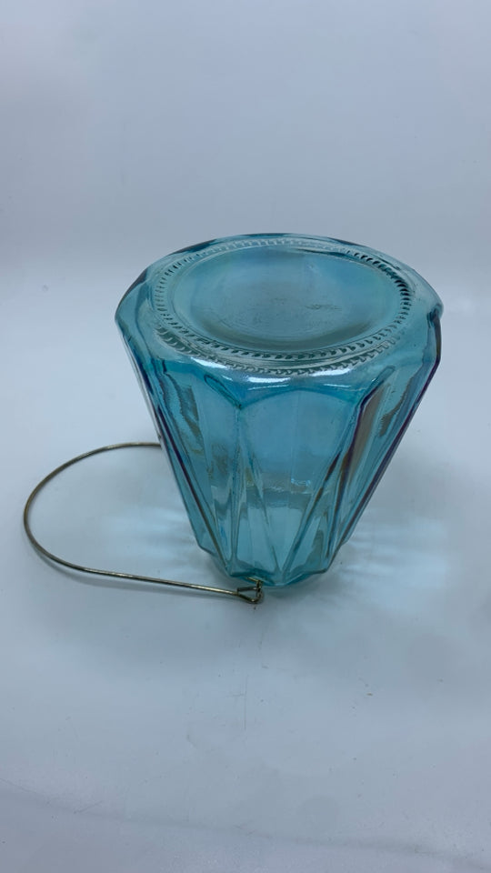 BLUE IRIDESCENT CANDLE HOLDER W/HANDLE.