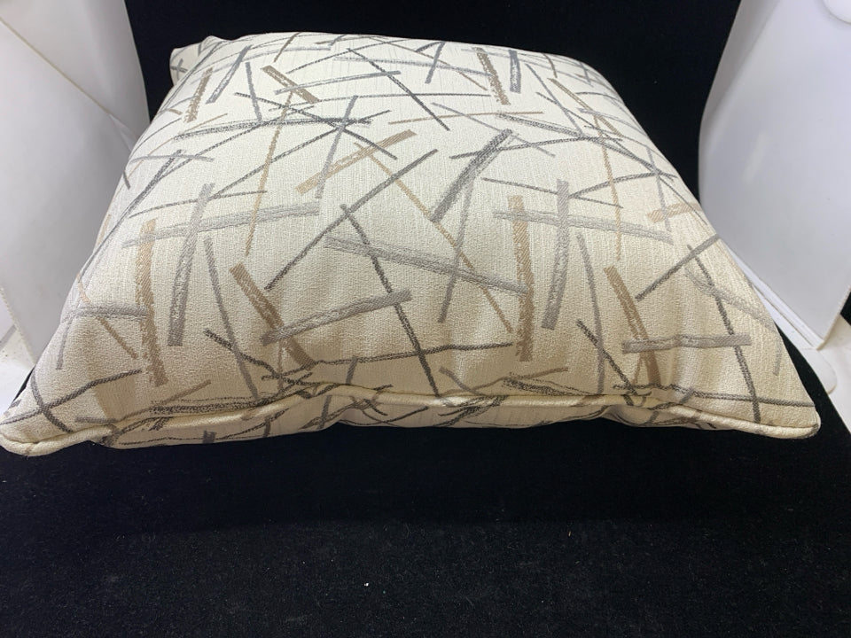 CREAM PILLOW W/GOLD, SILVER LINES.