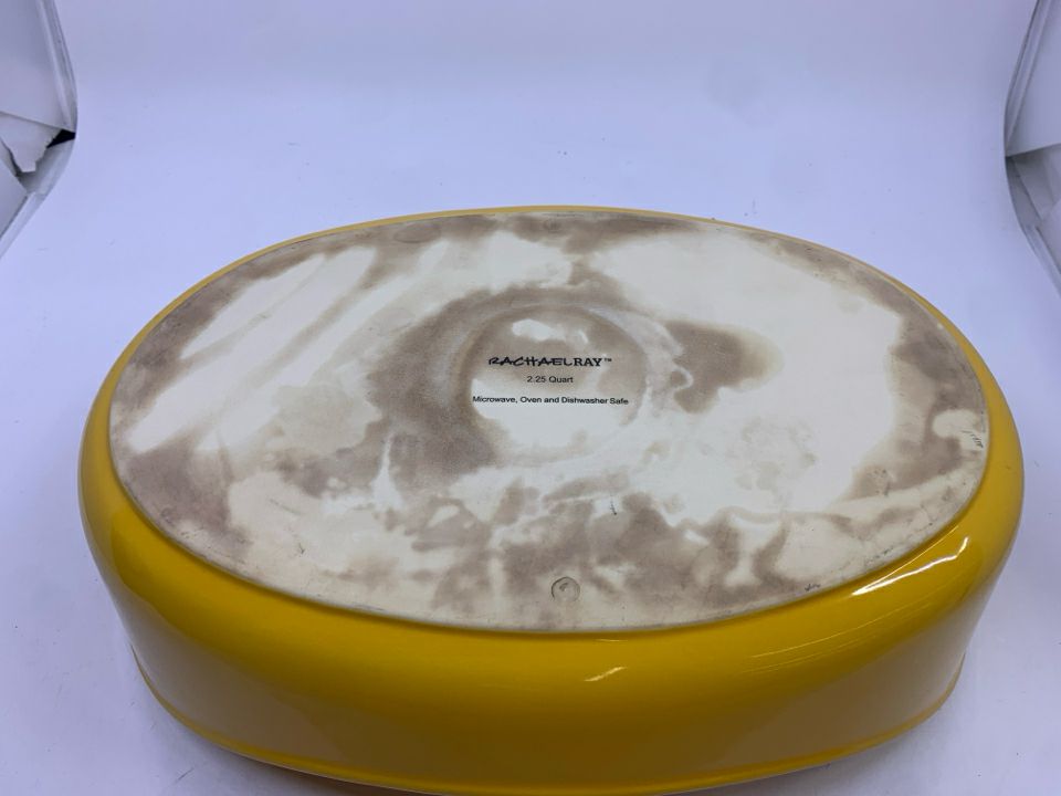 2 YELLOW OVAL BAKING DISHES RACHAEL RAY HANDLES.