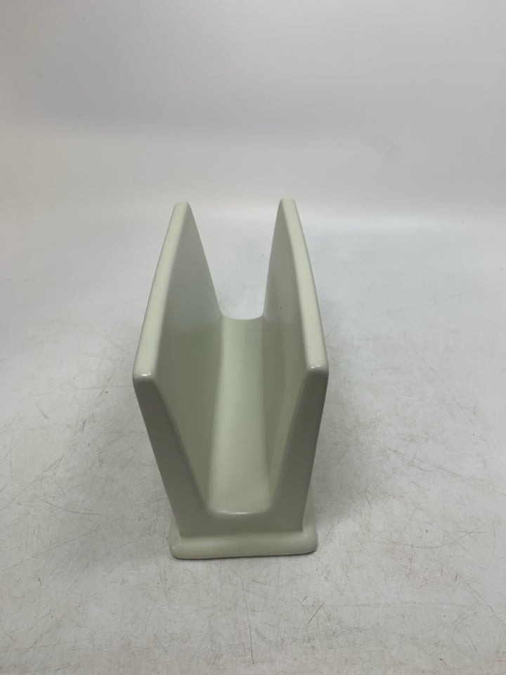 STONEWARE NAPKIN HOLDER.