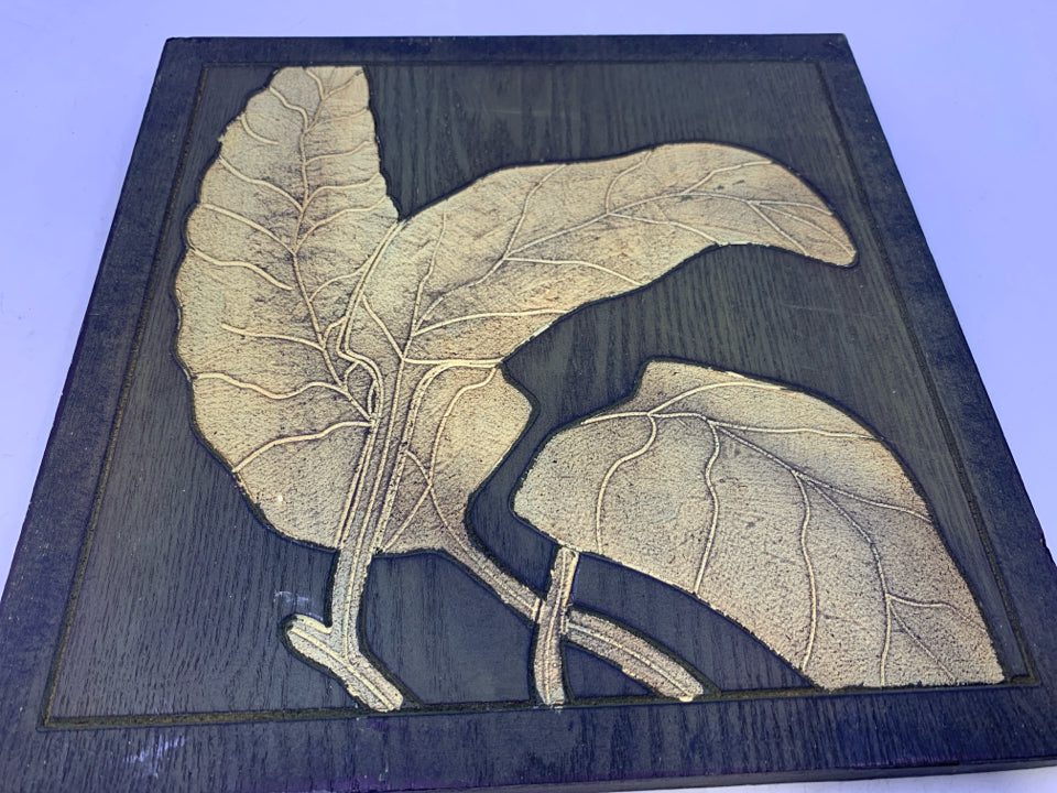 CARVED LEAVES WALL PLAQUE.