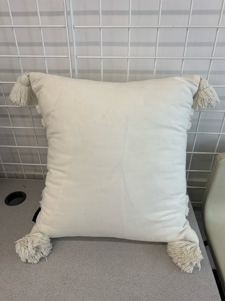 WHITE FABRIC PILLOW W/PINE TREE AND TASSELS.