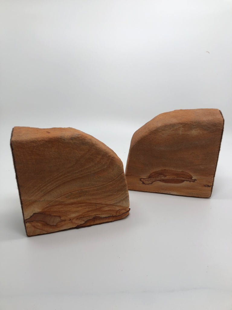 2 METAL HORSE RIDER ON SANDSTONE BOOKENDS.