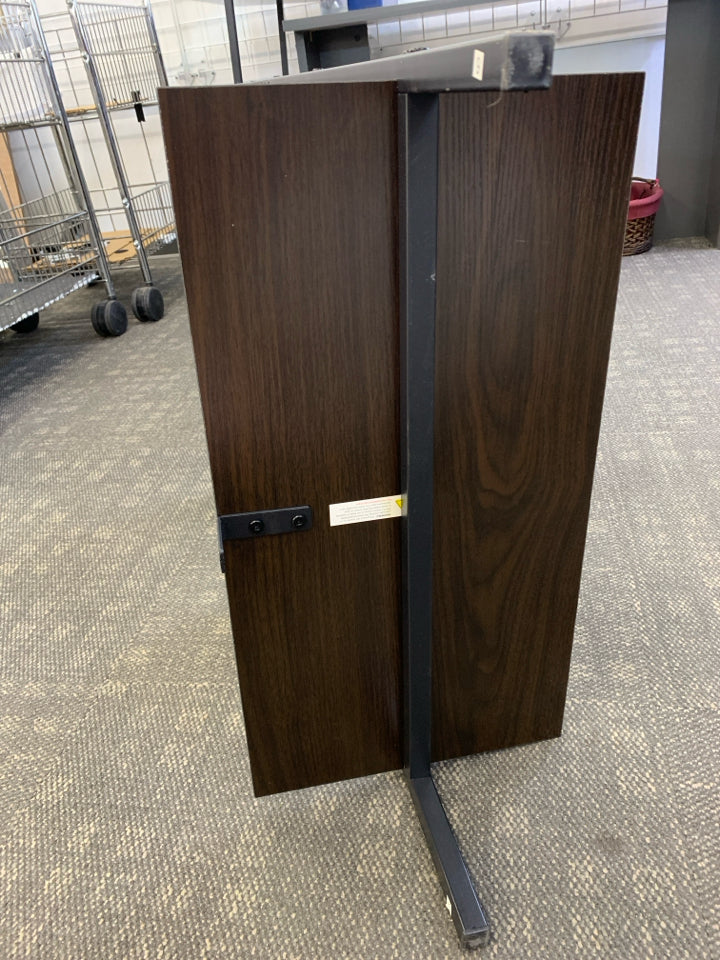 DARK FRAMED LADDER-STYLE WALL-MOUNT BOOKSHELF.