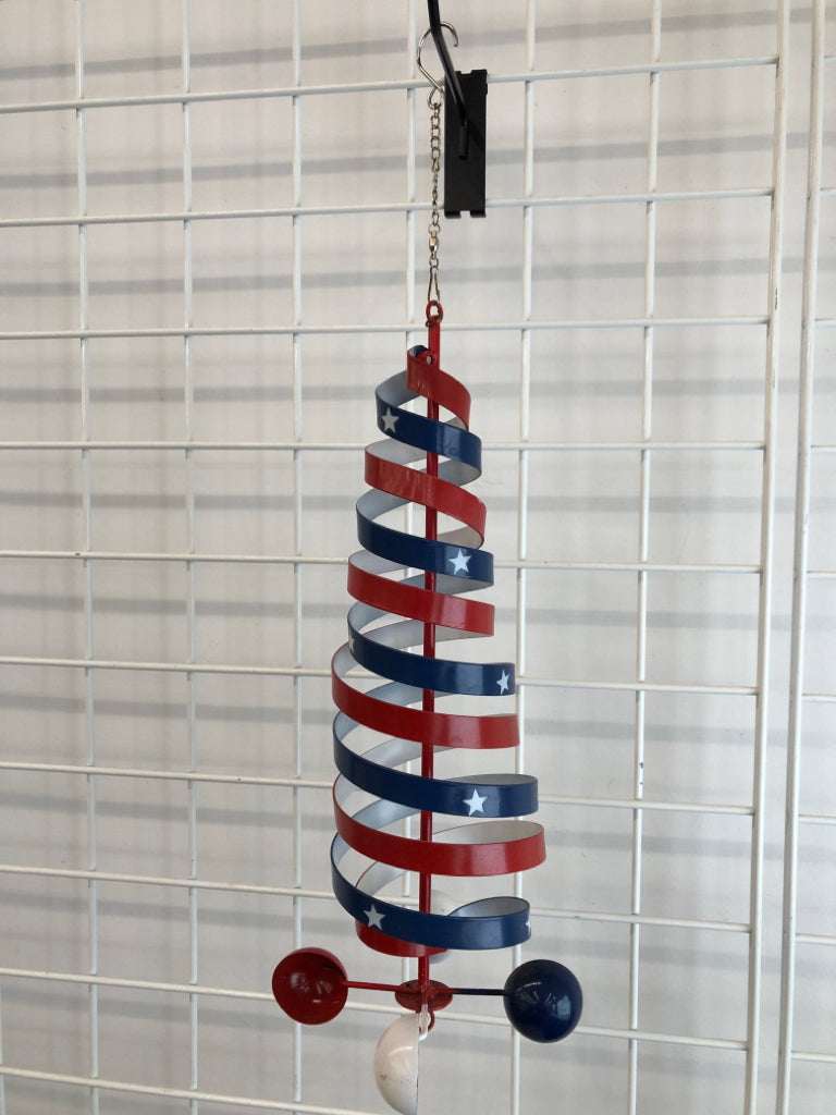 RED WHITE AND BLUE METAL WIND SPINNER.