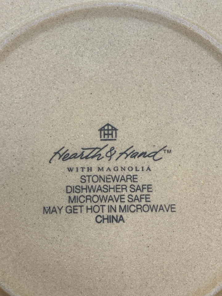4 WHITE STONEWARE PLATES W/RED DOTTED RIM.
