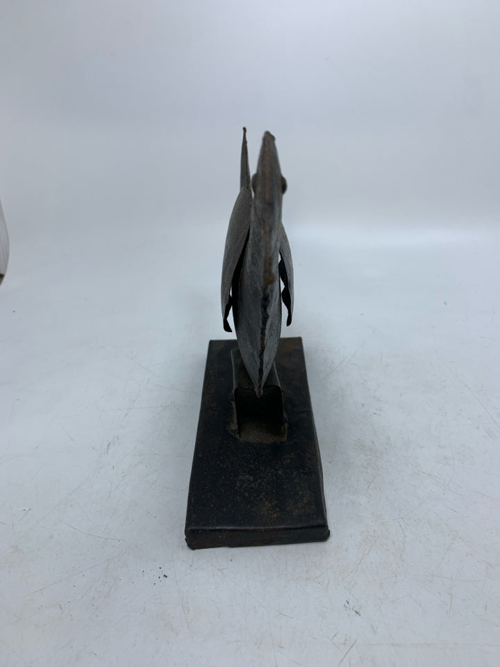 RUSTIC METAL CROW ON STAND.
