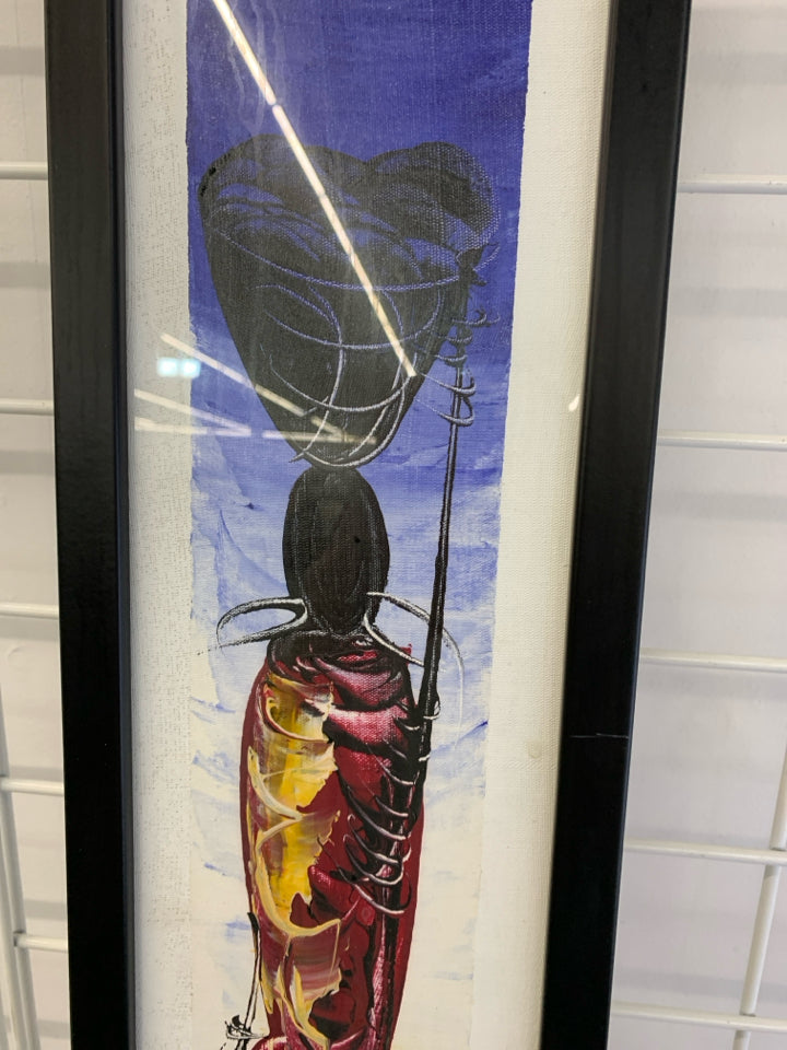 RED WARRIOR PAINT PRINT IN BLACK FRAME.