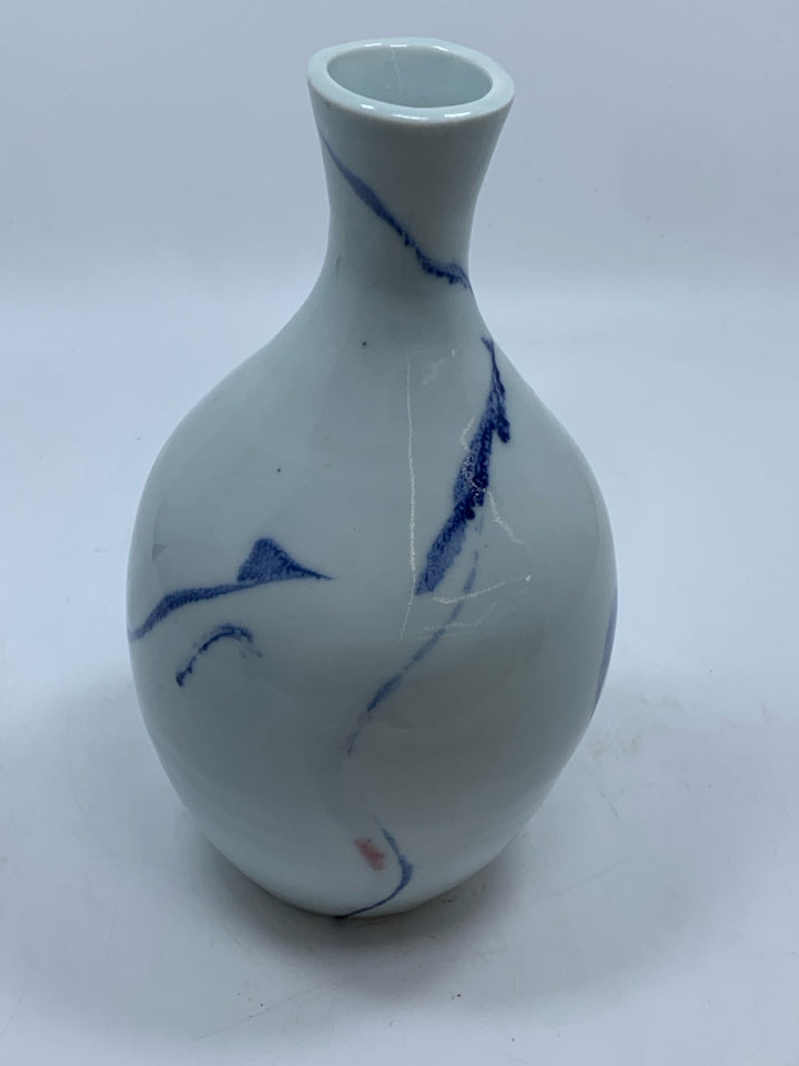 WHITE POTTERY VASE W/BLUE DESIGNS.